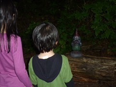 Creepy garden gnome at the end of the trail to the beach